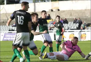  ??  ?? Paul Murphy’s bid to block Dean Kelly’s shot fails as Bray Wanderers take a first-half lead.