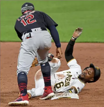  ?? Matt Freed/Post-Gazette ?? Jarrod Dyson is picked off second base in the bottom of the ninth inning Tuesday night at PNC Park. Francisco Lindor applies the tag for the Indians.