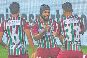  ?? Photo: ISL ?? Roy Krishna (centre) celebrate with teammates after he scored a goal against FC Goa on December 30, 2021.