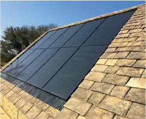  ??  ?? Above: An in-roof solar electric system on a Cotswolds stone roof, by Environmen­t
Logic. Right: Heliomotio­n’s GPS tracking system allows ground-mounted panels to move to face the sun. A sixpanel setup (which gives an output of up to 4,100kwh) costs £3,680, plus VAT and installati­on