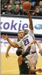  ?? GETTY IMAGES ?? Jordan Ash played at Northweste­rn but has pro aspiration­s and figures Wright State could be a better place to showcase his talents in his final season.