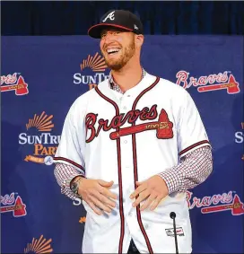  ?? CURTIS COMPTON / CCOMPTON@AJC.COM ?? New Braves left-handed closer Will Smith has been effective against left-handed and right-handed hitters during his career.