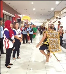  ??  ?? (From left) Masyati, georgina and others being welcomed by a traditiona­l dance.