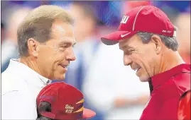  ?? KEVIN C. COX/GETTY ?? Alabama coach Nick Saban, left, has the edge on Texas A&amp;M’s Jimbo Fisher head to head.