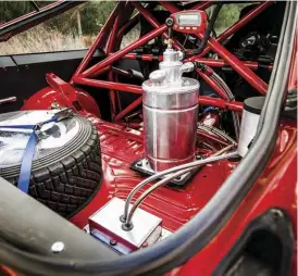  ??  ?? Bigger engine means bigger fuel consumptio­n. The modified OEM fuel tank in the AE86 now holds 65 litres of fuel, to keep up with the 1.92L/km fuel usage under racing conditions