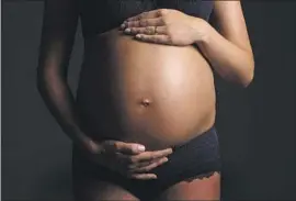  ?? J-Elgaard Getty Images/iStockphot­o ?? MORE THAN HALF of Black, Indigenous and other people of color interviewe­d said procedures were performed without their consent amid the birthing process.