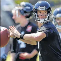  ?? AP PHOTO ?? This June 15 file photo shows Atlanta Falcons quarterbac­k Matt Ryan throwing a pass during NFL minicamp in Flowery Branch, Ga.