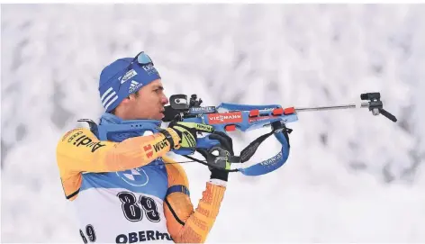  ?? FOTO: MARTIN SCHUTT/DPA ?? Simon Schempp beim Anschießen von Oberhof.