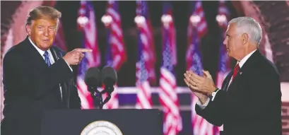  ?? SAUL LOEB/AFP VIA GETTY IMAGES ?? President Donald Trump and Vice-President Mike Pence at the third night of the Republican convention.