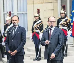  ??  ?? PLENTY OF WORK AHEAD: Jean Castex, France’s new prime minister, right, delivers a speech beside Edouard Philippe during a handover ceremony.