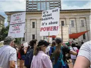  ?? LONDON BISHOP PHOTOS / STAFF ?? Abortion rights protesters gather Saturday in Courthouse Square in Dayton.