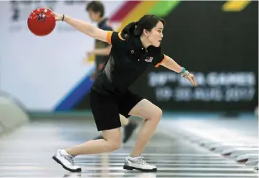  ?? ?? It’s going smooth: Sin Li Jane is currently second in Group a, three points behind leader Sabrina Laub of Germany.