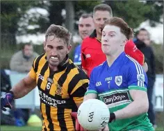  ??  ?? James Stafford of Glynn-Barntown is tackled by Brian Malone (Shelmalier­s) in the Tom Doyle Supplies SFC game in Taghmon on Friday.