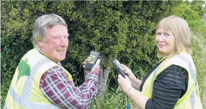  ?? PHOTO: RICHARD DAVISON ?? Tuned right in . . . Owaka bat lovers Annette and Murray Patterson say the first of two Catlins bat detection walks at Tawanui this summer were a success.