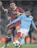  ??  ?? Familiar foes: Roberto Firmino and City’s Bernardo Silva