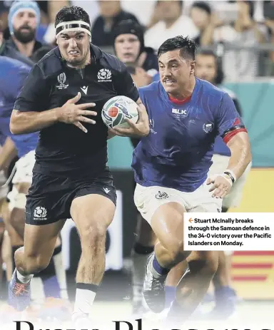  ??  ?? 2 Stuart Mcinally breaks through the Samoan defence in the 34-0 victory over the Pacific Islanders on Monday.