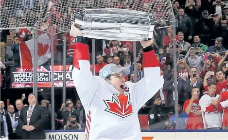  ?? BRUCE BENNETT/GETTY IMAGES ?? Team Canada captain and tournament MVP Sidney Crosby celebrates after a 2-1 victory over Team Europe in the World Cup of Hockey final Thursday at the Air Canada Centre in Toronto. Canada has no won 16 straight games and three straight best-on-best...