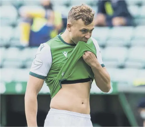  ??  ?? 0 Ryan Porteous cut a dejected figure after his costly error in Hibs’ defeat by St Johnstone at Easter Road on Saturday