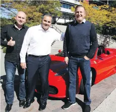  ?? ANDREW MCCREDIE ?? Scenic Rush’s Thom Boecker, left, and Bryan Kohare flank Remco Daal in front of one of the five supercars that will be used during Aidan’s Cup on Oct. 15 at Pitt Meadows Airport.