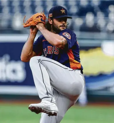  ?? Jamie Squire / Getty Images ?? Astros righthande­r Lance McCullers Jr. gets in gear for his start in the season’s second game on Saturday by throwing five innings Monday night, holding the Royals to one run on four hits.