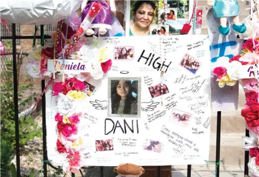  ?? OWEN ZILIAK/SUN-TIMES FILE ?? A memorial last July in Little Village for Karina Alvarez and her daughter, Daniela.