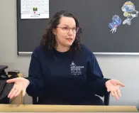  ?? The Sentinel-Record/Donald Cross ?? ■ Amy Brown-Westmorela­nd, outreach coordinato­r at the Arkansas School for Mathematic­s, Sciences, and the Arts, talks about the free Summer At ASMSA residentia­l camps on Friday in her office.