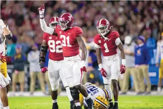  ?? VASHA HUNT/ASSOCIATED PRESS ?? Alabama linebacker Will Anderson Jr., shown celebratin­g a stop against LSU on Nov. 6, is closing in on an NCAA record for most tackles for a loss in a season.