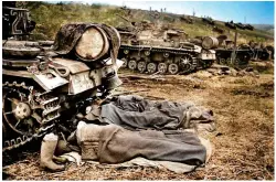  ?? ?? The same crew are photograph­ed sleeping next to their tank. The Panzer III was vulnerable to the Soviet T-85 and KV-1 tanks