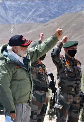  ?? ANI ?? Soldiers shout “Vande Mataram” and “Bharat Mata Ki Jai” as Prime Minister Narendra Modi meets them during his surprise visit to Ladakh, at Nimmoo in Leh on Friday.