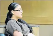  ?? RAFAEL OLMEDA/STAFF ?? Analiz Osceola is charged with manslaught­er in the death of her 3-year-old stepson.