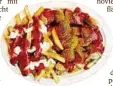  ??  ?? Eine Portion Currywurst ist Deutschlan­ds beliebtest­es Kantinenes­sen. Foto: dpa/pa