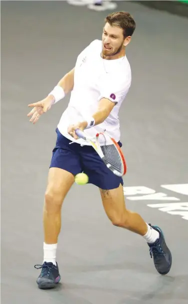  ?? Reuters ?? Britain’s Cameron Norrie in action against Taylor Fritz of the US during their Davis Cup match.