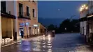  ??  ?? Heavy rains have flooded the streets of Berchtesga­den in southern Germany