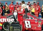 ?? RALPH FRESO — THE ASSOCIATED PRESS ?? Kyle Busch hoists his son Brexton in the air after winning the Monster Energy Cup Series race March 10 in Avondale, Ariz.