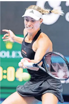  ?? FOTO: REUTERS/THOMAS PETER ?? Angelique Kerber beim Spiel der dritten Runde bei den China-Open gegen die Chinesin Zhang Shuai.