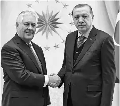  ?? — Reuters photo ?? Erdogan meets with Tillerson (left) in Ankara.