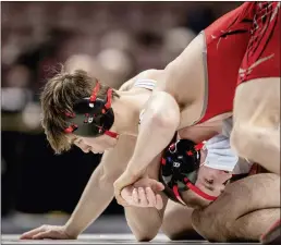  ?? NATE HECKENBERG­ER FOR MEDIANEWS GROUP ?? Coatesvill­e’s Nate Lucier works for positionin­g against Waynesburg Central’s Colton Stoneking on his way to a win in the 132-pound quarterfin­als.