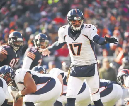  ?? Joe Amon, Denver Post file ?? Brock Osweiler, playing for the Broncos at Soldier Field in Chicago two years ago, has completed 490-of-819 passes (.598) in his 37-game NFL career for 5,101 yards and 26 touchdowns. He has thrown 22 intercepti­ons.