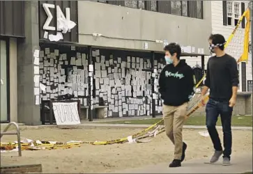  ?? Photograph­s by Al Seib Los Angeles Times ?? THE SIGMA NU fraternity house, where students plastered the wall with protest signs and angry notes. Many questioned fraternity culture and USC’s actions to address the problem of campus sexual assault.