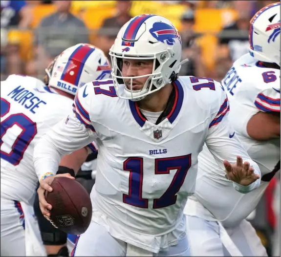  ?? GENE J. PUSKAR / THE ASSOCIATED PRESS ?? Buffalo Bills quarterbac­k Josh Allen looks to pass Aug. 20 in an exhibition games against the Pittsburgh Steelers. While the Bills have been the class of the AFC East in recent years, the remainder of the division will likely be tougher to play against in 2023. That includes the New York Jets, who traded for four-time league MVP Aaron Rodgers in a bid to reach the postseason for the first time since 2010.