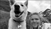  ?? AMELIA MILLING VIA AP ?? THIS JUNE 19 PHOTO BY AMELIA MILLING shows her with a 7-year-old Alaskan husky named Nanook, that is credited with helping rescue her when she injured was hiking a trail in the Chugash State Park east of east of Anchorage, Alaska.