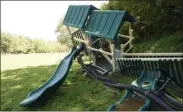  ?? BILL UHRICH — MEDIANEWS GROUP ?? Playground equipment lies crumbled in Ironstone Park after being swept away during the Ironstone Creek flooding on July 11.