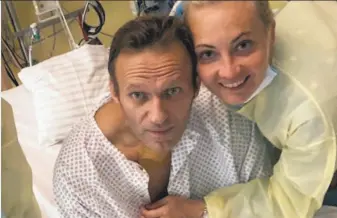  ?? Navalny instagram via Associated Press ?? Russian opposition leader Alexei Navalny posted this picture of himself and his wife, Yulia, from a German hospital where he is recovering after being poisoned last month.