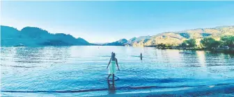  ??  ?? Christie Graham takes a refreshing dip after a day of exploring the delights of the Okanagan Valley.