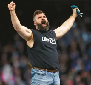  ?? TIM NWACHUKWU/GETTY ?? Former Eagles center Jason Kelce reacts Saturday following a match during Night One of WrestleMan­ia 40 at Lincoln Financial Field in Philadelph­ia.