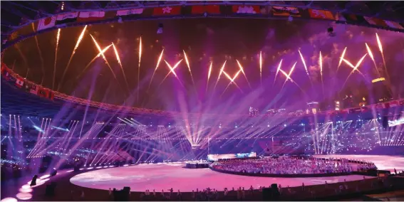  ??  ?? Fireworks explode during the closing ceremony for the 18th Asian Games in Jakarta