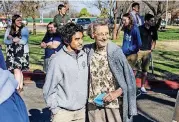  ??  ?? Sister Betty Elmer talks with Mount St. Mary High School student Christian Yabut during a celebratio­n for her retirement and the school’s 115th anniversar­y.