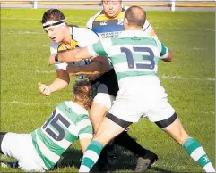  ?? PICTURE / BEVAN CONLEY ?? Marist and Border mix it up during Saturday’s game at Spriggens Park.