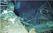  ??  ?? ‘Humbling discovery’: USS Indianapol­is, main picture, in Pearl Harbor in 1937. The wreck has been found, 72 years after her sinking, at the bottom of the North Pacific, left