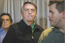  ?? AP file photo ?? Brazil’s former President Jair Bolsonaro prepares to speak to the press in Belo Horizonte, Brazil on June 30, the day that judges ruled him ineligible to run for any political office again until 2030 after concluding that he abused his power and cast unfounded doubts on the country’s electronic voting system.